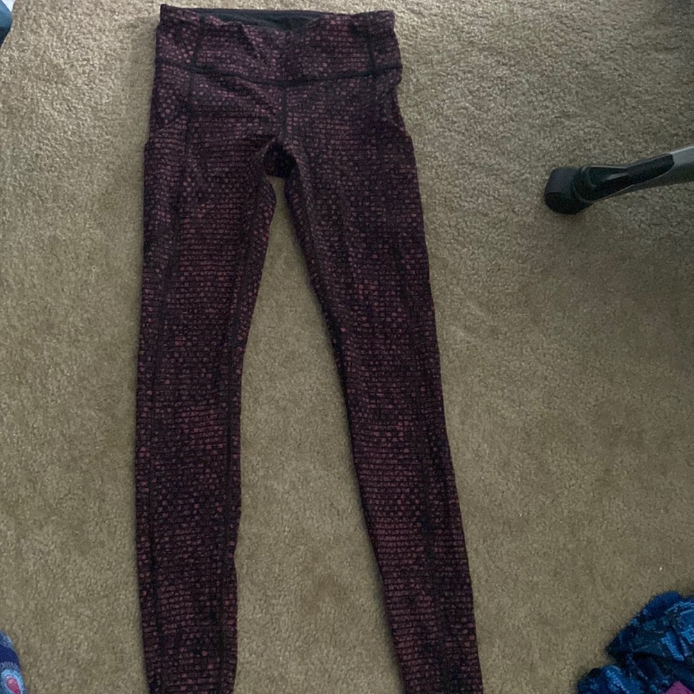 Lululemon size 4 full length tight side pockets and back zipper barely worn red